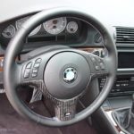 BMW 2002 M 5 carbon fiber steering wheel looking down